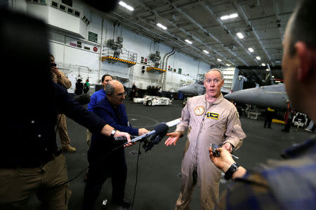 Commander, Carrier Strike Group TWO Rear Admiral Kenneth Whitesell, speaks to media on board the U.S. aircraft carrier, USS George H. W. Bush after transiting the Strait of Hormuz in this photo taken on March 21, 2017. REUTERS/Hamad I Mohammed