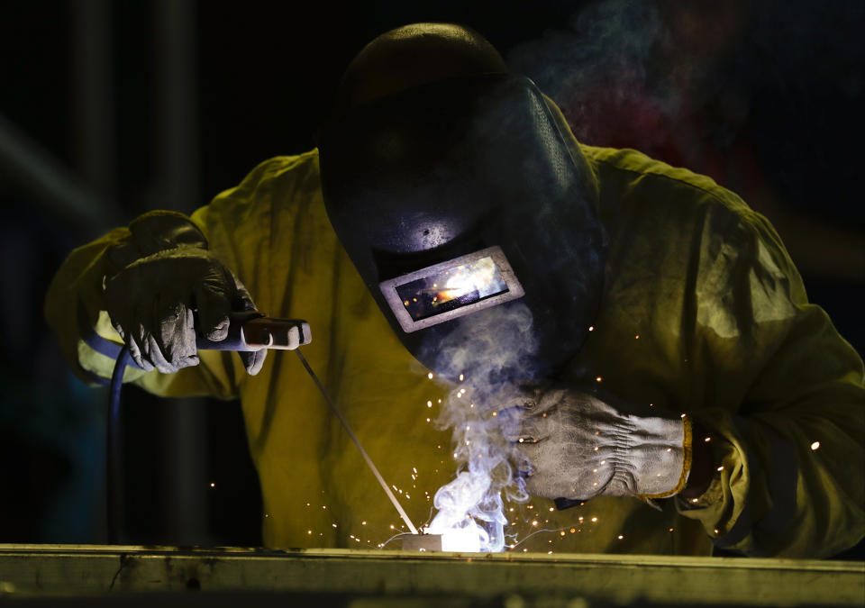 Andre Ribeiro works on the boxing venue