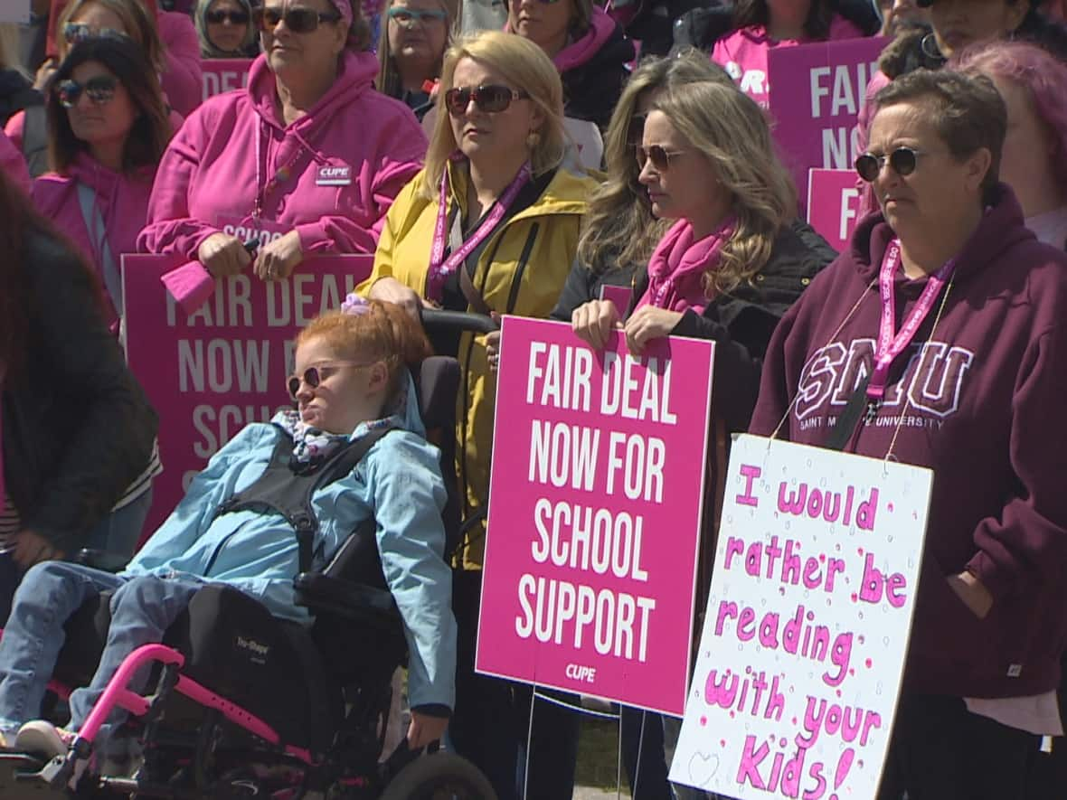 Striking CUPE 5047 members and their supporters rally at the Grand Parade in Halifax on Thursday, May 18. (Brian MacKay/CBC - image credit)