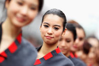 SHANGHAI, CHINA - APRIL 15: Grid girls attend the drivers parade before the Chinese Formula One Grand Prix at the Shanghai International Circuit on April 15, 2012 in Shanghai, China. (Photo by Mark Thompson/Getty Images)