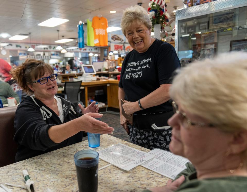 Debbie Keith, a server for the past 35 years, has a laugh with first-time customers Betty Jo Owen (left), and her aunt Diana Leaf, Indianapolis, Friday, May 6, 2022, at Charlie Brown’s Pancake and Steak House. 