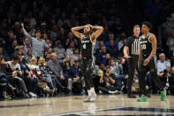 Providence's Jared Bynum (4) reacts after a called foul during the second half of an NCAA college basketball game against Xavier, Wednesday, Feb. 1, 2023, in Cincinnati. (AP Photo/Jeff Dean)