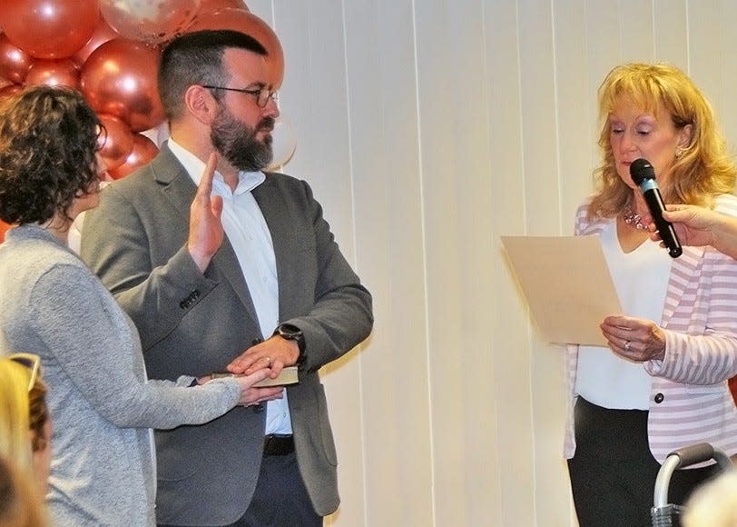 Russell Robertson takes the oath of office, stepping into the position of Wayne County Auditor. He replace Jarra Underwood, who retired in February.