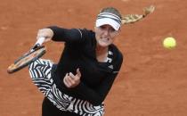 Tennis - French Open - Roland Garros - Francesca Schiavone of Italy vs France's Kristina Mladenov Paris, France - 24/05/16. France's Kristina Mladenov serves. REUTERS/Gonzalo Fuentes