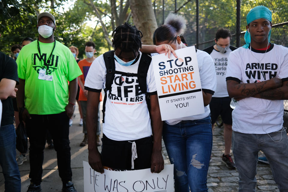 The group Save Our Streets (S.O.S.) holds a peace march in response to a surge in shootings in Brooklyn, New York on July 16, 2020. The march was held near the scene where a one-year-old child was recently shot and killed. | Spencer Platt—Getty Images