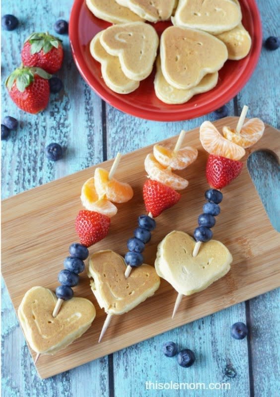 <p>This Ole Mom</p><p>Who wouldn't love these Cupid-approved kebobs? So cute!</p><p><strong>Get the recipe: <a href="https://www.thisolemom.com/valentines-day-cupid-arrow-pancake-kabobs/" rel="nofollow noopener" target="_blank" data-ylk="slk:Cupid Arrow Pancake Kabobs;elm:context_link;itc:0;sec:content-canvas" class="link ">Cupid Arrow Pancake Kabobs</a></strong></p><p><strong>Related: <a href="https://parade.com/1064582/felicialim/best-skewered-desserts-recipes/" rel="nofollow noopener" target="_blank" data-ylk="slk:32 Best Skewered Desserts;elm:context_link;itc:0;sec:content-canvas" class="link ">32 Best Skewered Desserts</a></strong></p>