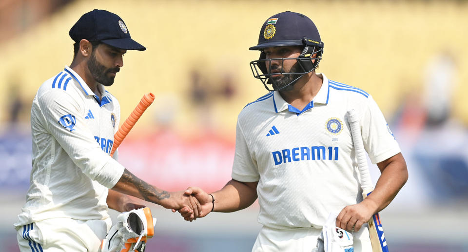 Seen here, Ravindra Jadeja congratulates India captain Rohit Sharma on his century against England in the third Test. 