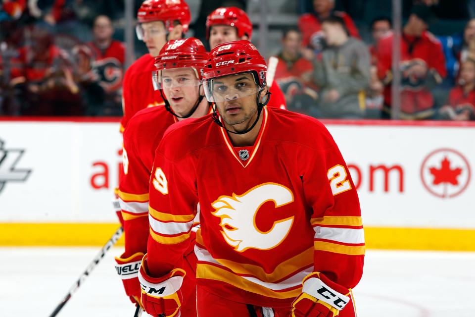 CALGARY, CANADA - APRIL 7: Akim Aliu #29 of the Calgary Flames skates to the bench after socring his first NHL goal against the Anaheim Ducks on April 7, 2012 at the Scotiabank Saddledome in Calgary, Alberta, Canada. (Photo by Gerry Thomas/NHLI via Getty Images)