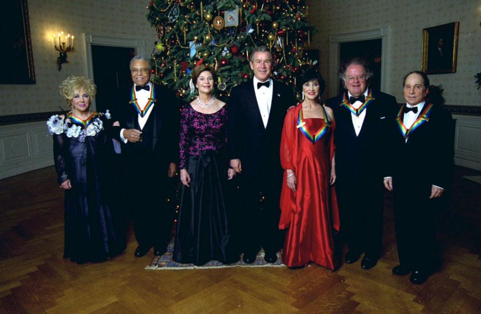 President George W. Bush welcomes recipients of Kennedy Center Honors of 2002 to White House (L-R) actors Elizabeth Taylor, James Earl Jones & Chita Rivera, conductor James Levine & singer Paul Simon.