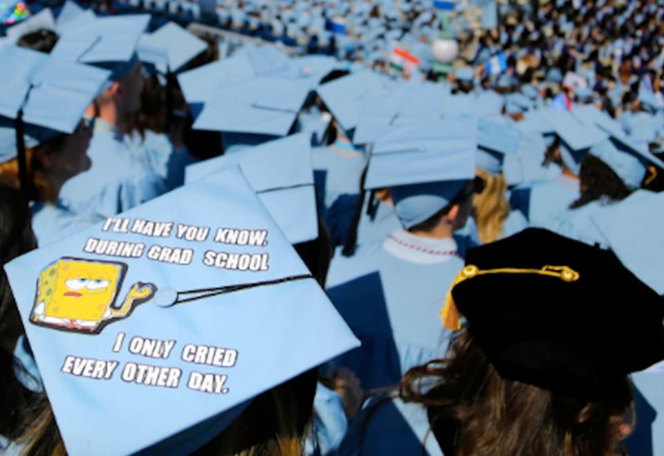 In this Wednesday, May 17, 2017, file photo, graduating students fill the Columbia University campus during a graduation ceremony in New York. Having college debt disappear is something many student loan holders can only dream of. (AP Photo/Seth Wenig, File)