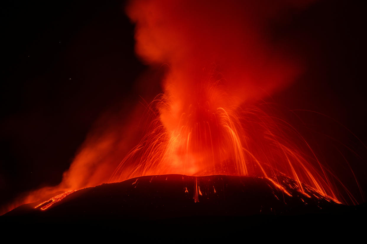 Lava rises from Mount Etna in Italy on Aug. 14