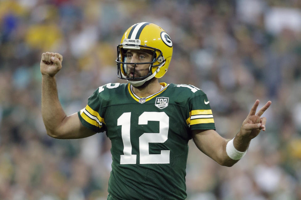 The Green Bay Packers just gave Aaron Rodgers a massive contract, but that doesn’t mean you need to overpay for him or any quarterback in your fantasy draft. (AP Photo/Jeffrey Phelps, File)