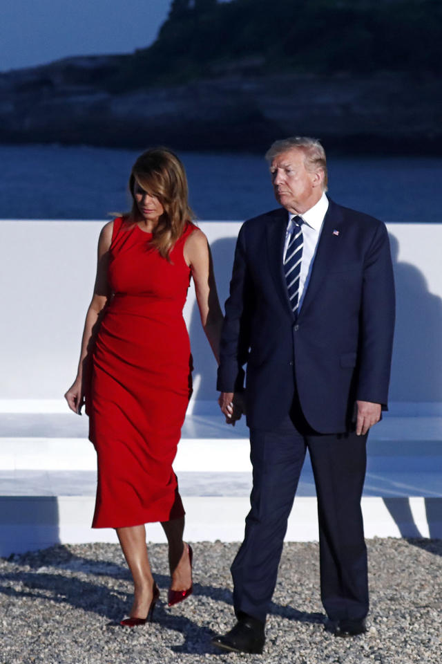 France's First Lady Pops in Red Dress & Graphic Block Heels With Melania  Trump