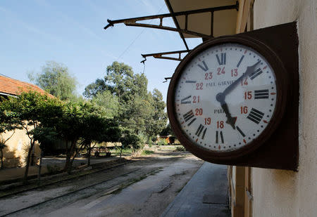 A clock is seen at the remains of the old railway station in Beirut, Lebanon October 27, 2017. REUTERS/Jamal Saidi