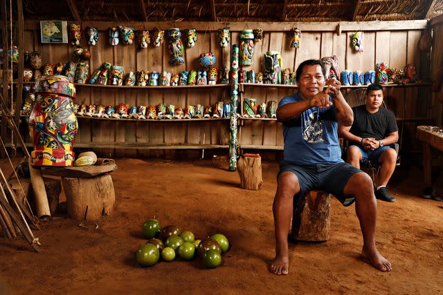 <p>Lebo Lukewarm/Courtesy of Intrepid Travel</p> Maleku tribal member JaquÃ­ma â€œEliasâ€ Elizondo-Castro teaches visitors about local culture.