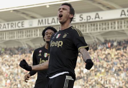 Football Soccer - Carpi v Juventus - Braglia stadium, Modena, Italy- 20/12/15 - Juventus' Mario Mandzukic celebrates after scoring a goal. REUTERS/Alessandro Garofalo