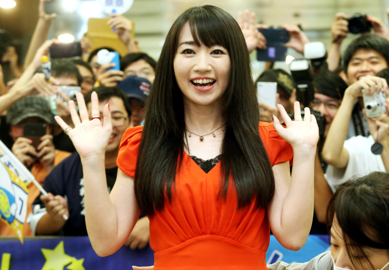 TAIPEI, TAIWAN - OCTOBER 03:  (CHINA AND TAIWAN OUT) Japanese voice actress Nana Mizuki arrives at Taipei Songshan Airport for her concert in Taipei on October 3, 2014 in Taipei, Taiwan.  (Photo by Visual China Group via Getty Images/Visual China Group via Getty Images)