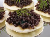 <p>Definitely one for special occasions, you’ll certainly be showing that special someone you’ve pushed the boat out if you serve up caviar. Why not serve up some canapes complete with a nicely-paired wine or champagne? [Photo: Food and Drink/REX/Shutterstock] </p>