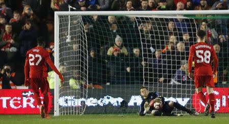 Football Soccer Britain - Plymouth Argyle v Liverpool - FA Cup Third Round Replay - Home Park - 18/1/17 Liverpool's Divock Origi has his penalty saved by Plymouth Argyle's Luke McCormick Action Images via Reuters / Paul Childs Livepic