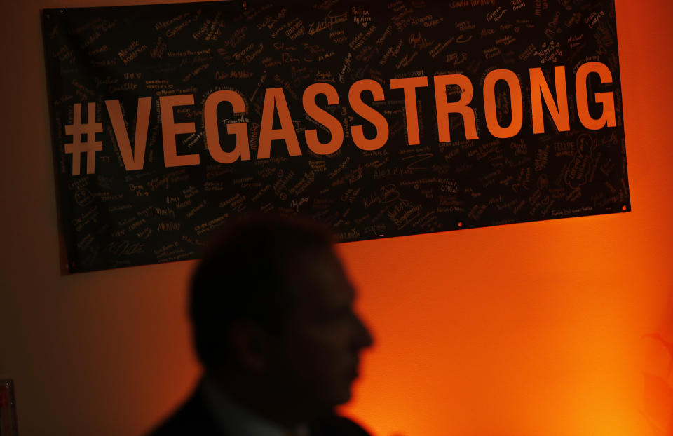 A Vegas Strong sign hangs on the wall during a reunion event for victims of the Oct. 1 shooting and their health care providers at Sunrise Hospital, Friday, Sept. 14, 2018, in Las Vegas. (AP Photo/John Locher)