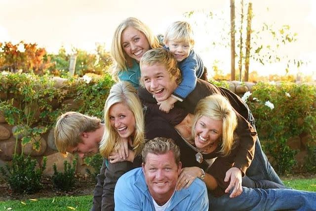 <p>Courtesy Cherya Cavanaugh</p> The Cavanaugh family (clockwise from top left: Kate, Kelley, David, Cherya, Tom, Tommy and Cassidy) in 2009.