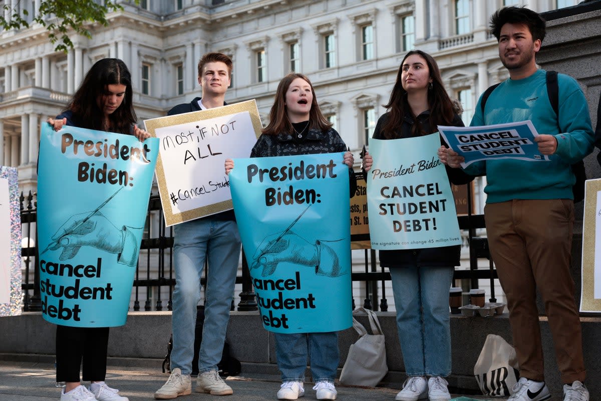 Student loan debt relief advocates rally outside the White House in April 2022.  (Getty Images)