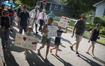 <p>Demonstrators participate in a Medicare For All march in Bloomington, Ind., Monday, July 24, 2017. The group marched from Rose Hill Cemetery to the Monroe County Courthouse. (Photo: Alex McIntyre/The Herald-Times via AP) </p>