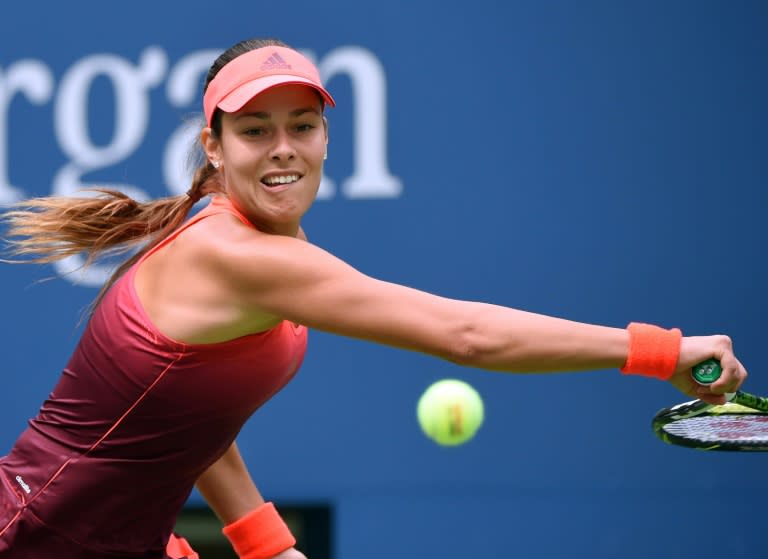 Ana Ivanovic of Serbia returns a shot Dominika Cibulkova of Slovakia during their US Open women's singles on August 31, 2015 in New York