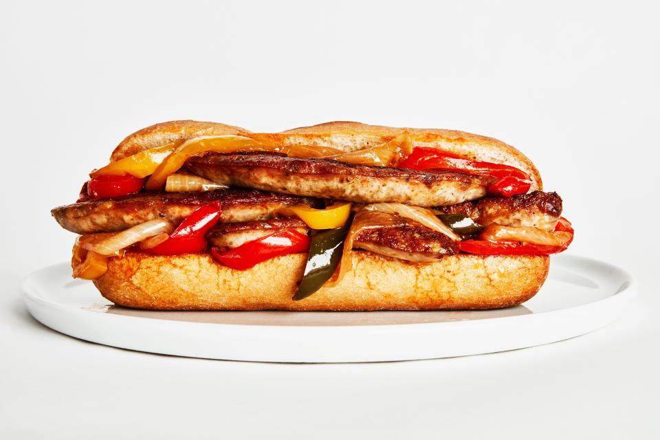 Although your traditional sausage, peppers, and onions sandwich may not have tomato paste, we like to caramelize a little bit into the mixture for a sweet, saucy, umami-rich hit of flavor. <a rel="nofollow noopener" href="https://www.bonappetit.com/recipe/sausage-peppers-and-onions-subs?mbid=synd_yahoo_rss" target="_blank" data-ylk="slk:See recipe.;elm:context_link;itc:0;sec:content-canvas" class="link ">See recipe.</a>