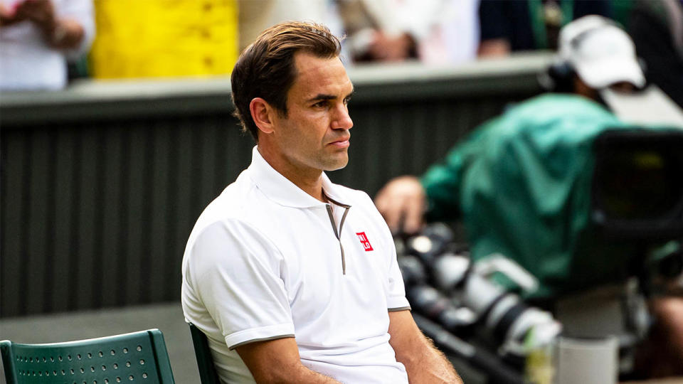 Roger Federer looking dejected after his loss at Wimbledon 2019 against Novak Djokovic.