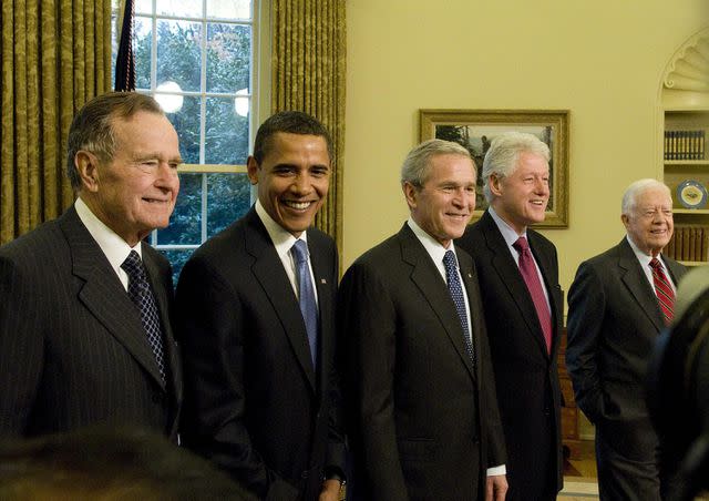 Photo by Ron Sachs-Pool/Getty Images Presidents George H.W. Bush, Barack Obama, George W. Bush, Bill Clinton and Jimmy Carter