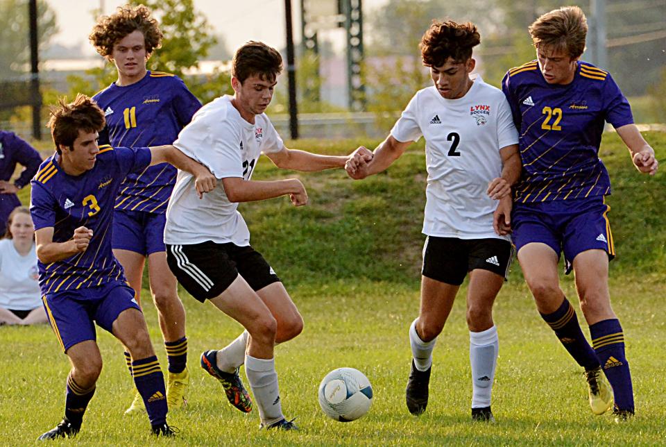 Defenders Lucas Spooner (3), Conner Schlaht (11) and Ethan Bohling (22) and the fifth-seeded Watertown High School boys soccer team will host Rapid City Central at 5 p.m. Tuesday in the opening round of the state Class AA playoffs at the ANZA Soccer Complex.