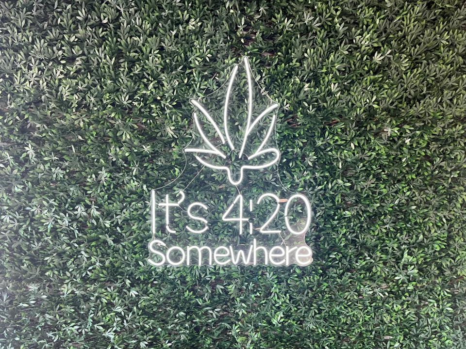 A sign at Flower Shop Dispensary at 2211 W. 49th Street in Sioux Falls declares "It's 4:20 somewhere" on Sept. 5, 2022.