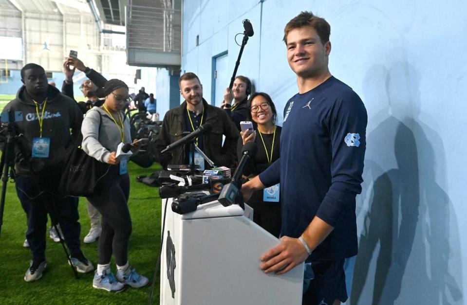 Drake Maye smiles as he speaks with the media following the Carolina Football Pro Day at UNC Chapel Hill’s Koman Indoor Practice Facility on Thursday, March 28, 2024.