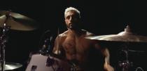 This image released by Amazon Studios shows Riz Ahmed in a scene from "Sound of Metal." Ahmed stars as a punk metal drummer who experiences sudden severe hearing loss. (Amazon Studios via AP)