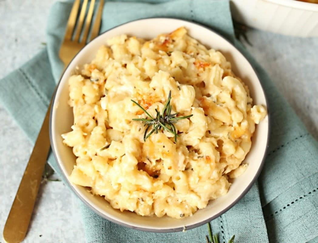 <p>Kitchen Divas</p><p>Classic comfort food in every bite!</p><p><strong>Get the recipe: </strong><a href="https://kitchendivas.com/easy-rosemary-macaroni-and-cheese/" rel="nofollow noopener" target="_blank" data-ylk="slk:Rosemary Mac and Cheese;elm:context_link;itc:0;sec:content-canvas" class="link rapid-noclick-resp"><strong>Rosemary Mac and Cheese</strong></a></p>