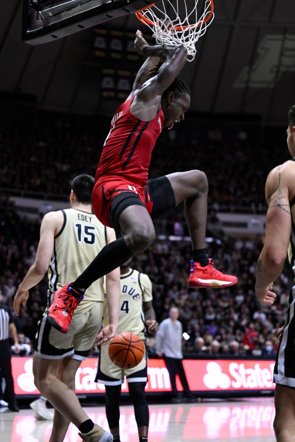 Rutgers Scarlet Knights center Clifford Omoruyi (11) dunks the ball during the first half against the Purdue Boilermakers  at Mackey Arena.