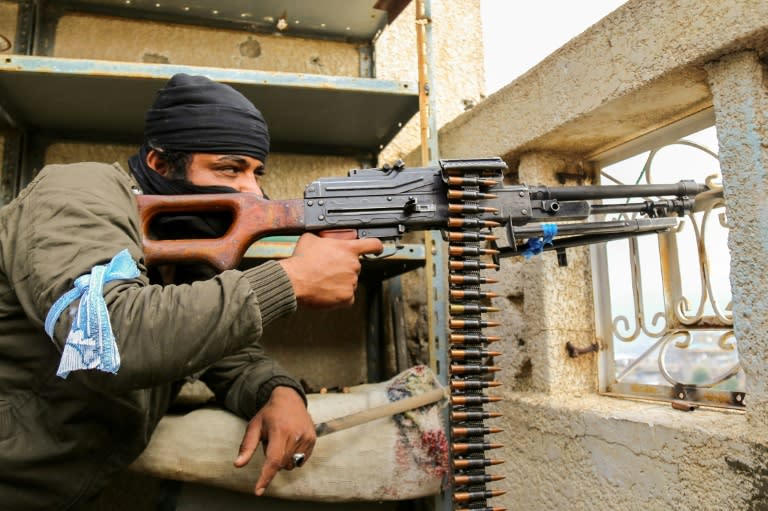 Tribesman from the Popular Resistance Committees, supporting forces loyal to Yemen's Saudi-backed President Abedrabbo Mansour Hadi, in the city of Taez