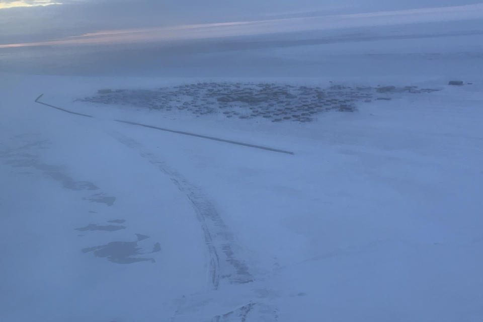 An aerial view shows the northwest Alaska village of Point Hope on the Chukchi Sea, on Sunday, Feb. 25, 2024. A fatal shooting at a home in a remote Inupiat whaling village on Alaska's northwest coast on Sunday, Feb. 25, 2024, shook the small community in Point Hope. (Ka'ainoa Ravey via AP)