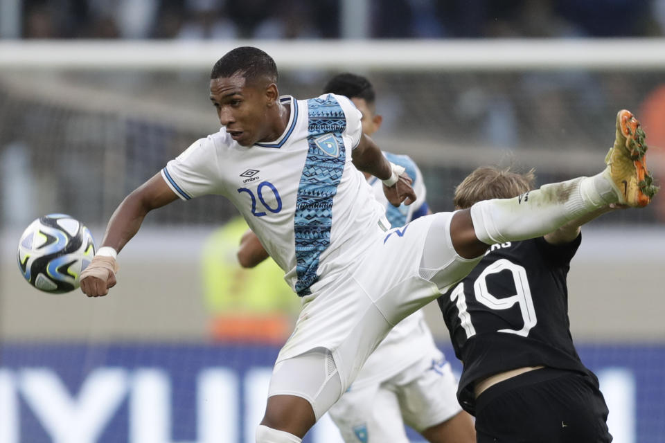 Guatemala's Figo Montano, left, and New Zealand's Kian Donkers battle for the ball during a FIFA U-20 World Cup Group A soccer match at the Santiago del Estero Stadium in Santiago del Estero, Argentina, Saturday, May 20, 2023. (AP Photo/Nicolas Aguilera)