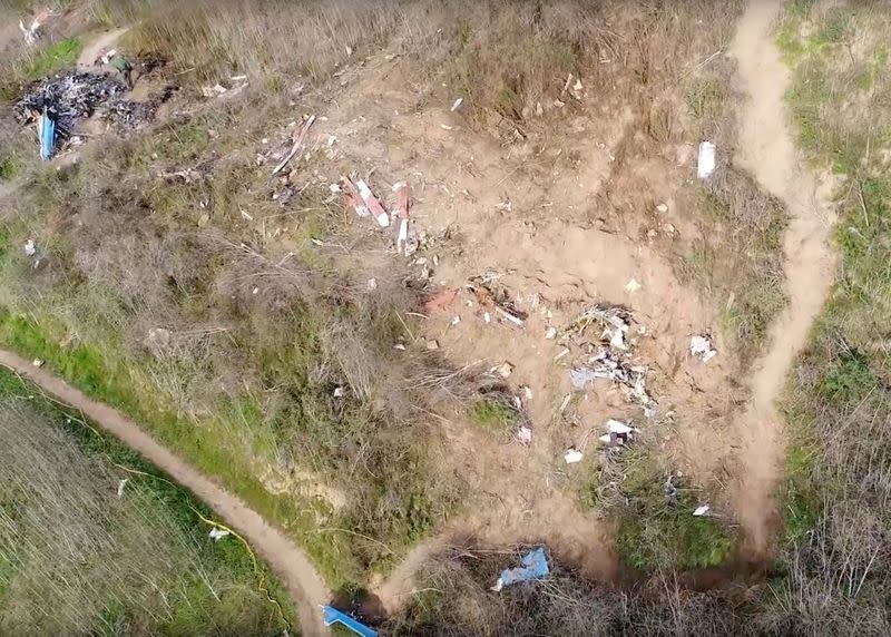 The site of the helicopter crash that killed Kobe Bryant and eight others is seen in a screen grab from drone footage