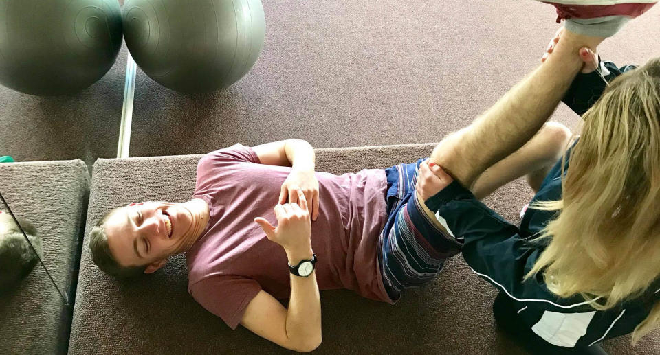 A photo of Ben during one of his many strenuous rehab sessions. Source: Facebook/Roll on Ben Oakley