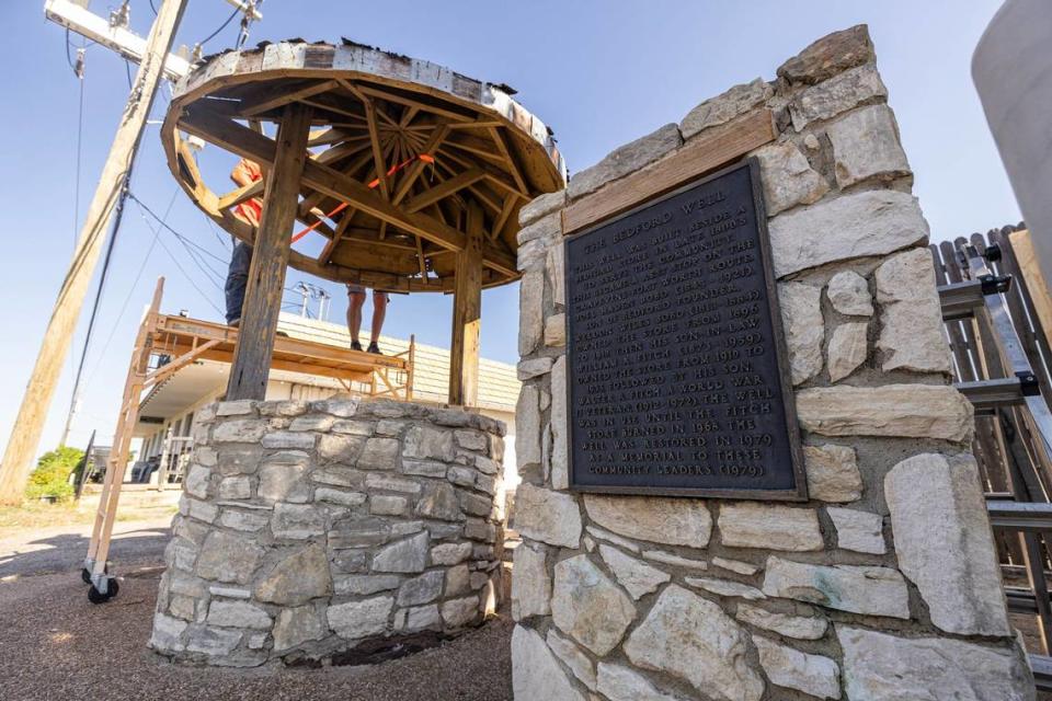 The historical marker for the Bedford Well is next to the well that is being restored by Boy Scout Reese Hughes and close family friends on Bedford Road in Bedford.