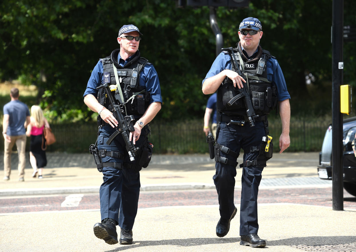 Armed police pictured on patrol in London earlier this year (PA)