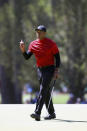 Tiger Woods reacts after his par putt on the third hole during the final round of the Masters golf tournament, Sunday, April 10, 2022, in Augusta, Ga. (Curtis Compton/Atlanta Journal-Constitution via AP)