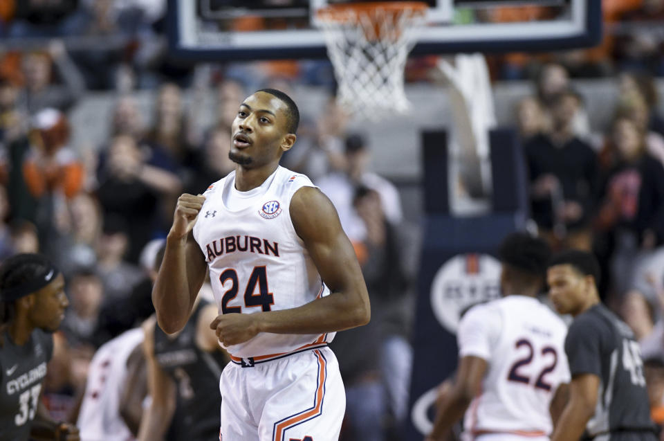 Auburn forward Anfernee McLemore (24) celebrates a 3-point basket against Iowa State during the first half of an NCAA college basketball game Saturday, Jan. 25, 2020, in Auburn, Ala. (AP Photo/Julie Bennett)