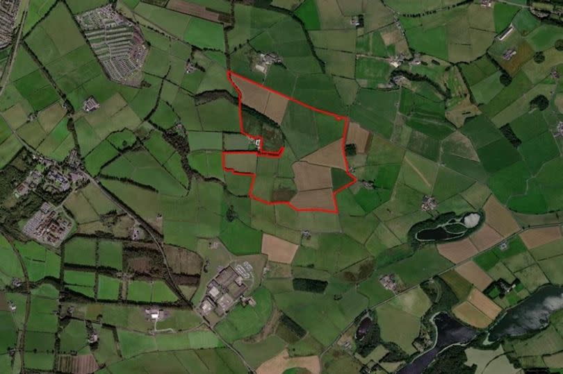 An aerial shot of the proposed site (in red)