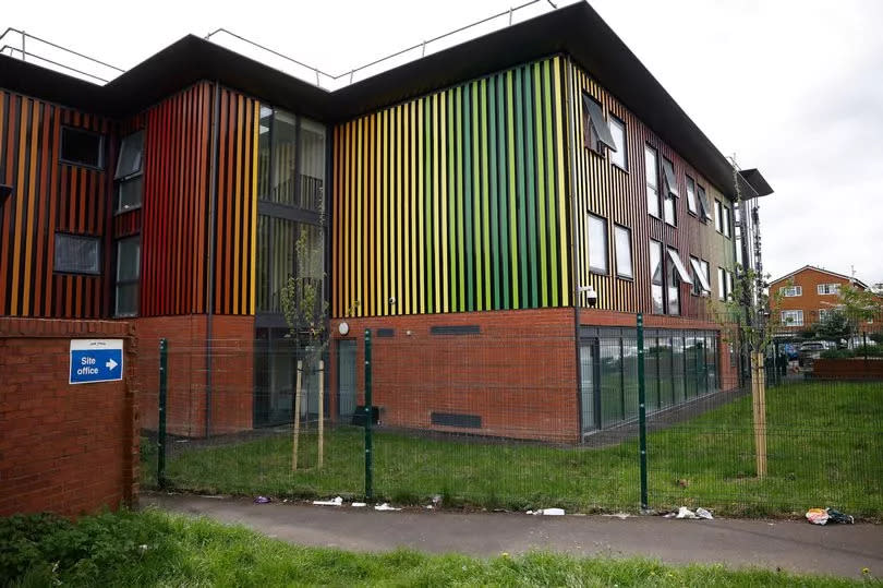 The outside of a building with colourful cladding