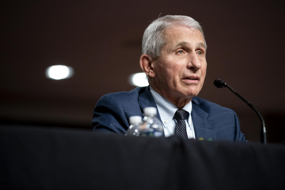 Dr. Anthony Fauci speaks into a microphone.