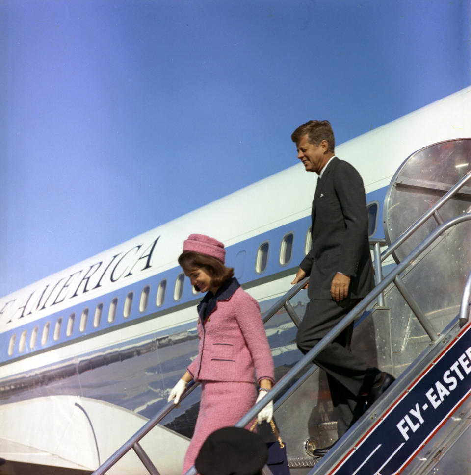 Former U.S. President John F. Kennedy and first lady Jacqueline Kennedy descend the stairs from Air Force One after arriving at Love Field in Dallas,Texas, in this handout image taken on November 22, 1963. Friday, November 22, 2013, will mark the 50th anniversary of the assassination of President Kennedy. REUTERS/Cecil Stoughton/The White House/John F. Kennedy Presidential Library  (UNITED STATES: Tags: POLITICS ANNIVERSARY)  ATTENTION EDITORS - THIS IMAGE WAS PROVIDED BY A THIRD PARTY. FOR EDITORIAL USE ONLY. NOT FOR SALE FOR MARKETING OR ADVERTISING CAMPAIGNS. THIS PICTURE IS DISTRIBUTED EXACTLY AS RECEIVED BY REUTERS, AS A SERVICE TO CLIENTS